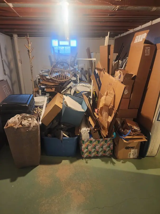 Roll-off dumpster container at job site for 8 Yard Dumpster Rental in Audubon